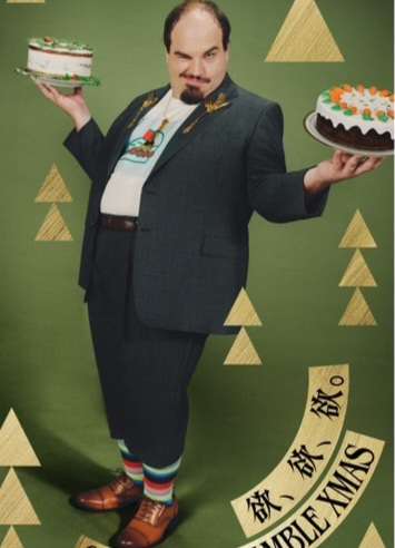 Zack Ringler in a colorful commercial character portrait holding cakes